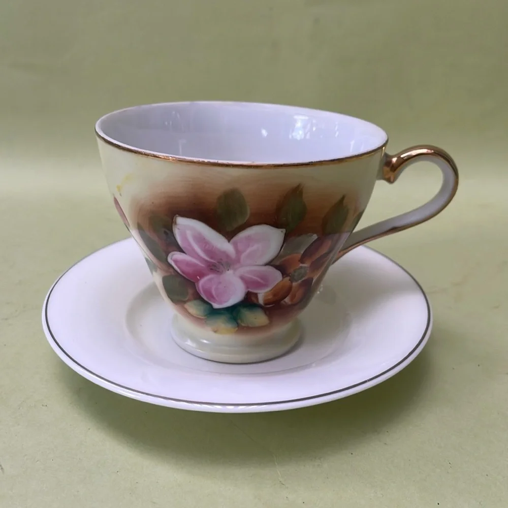 Vintage tea cup with saucer